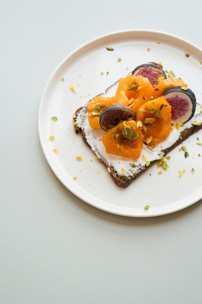 pexels-photo-26329282-26329282 Fresh fig and persimmon toast on a white plate. Perfect for a healthy breakfast.